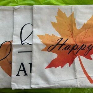 Decorative pillow covers with autumn theme.